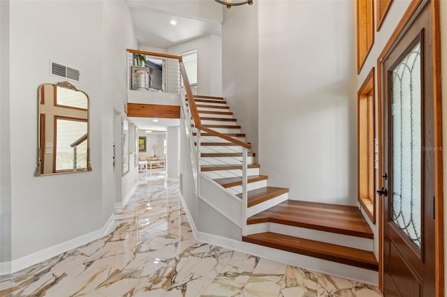 520 Lafayette Blvd, Oldsmar, FL 34677 - foyer with plenty of natural light, baseboards, and marble finish floor