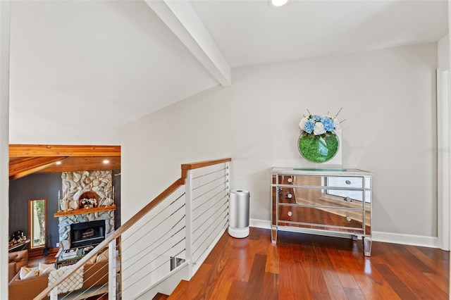 520 Lafayette Blvd, Oldsmar, FL 34677 - hallway with an upstairs landing, baseboards, wood-type flooring, and vaulted ceiling with beams