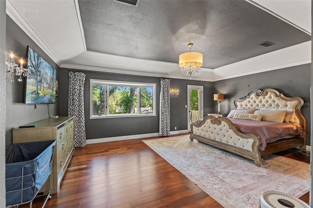 520 Lafayette Blvd, Oldsmar, FL 34677 - bedroom with a tray ceiling, multiple windows, hardwood / wood-style floors, and a notable chandelier