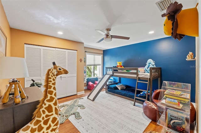 520 Lafayette Blvd, Oldsmar, FL 34677 - bedroom featuring a closet, wood finished floors, a ceiling fan, and recessed lighting