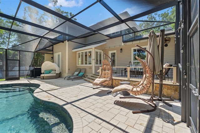 520 Lafayette Blvd, Oldsmar, FL 34677 - rear view of house with a patio, a fenced in pool, and glass enclosure