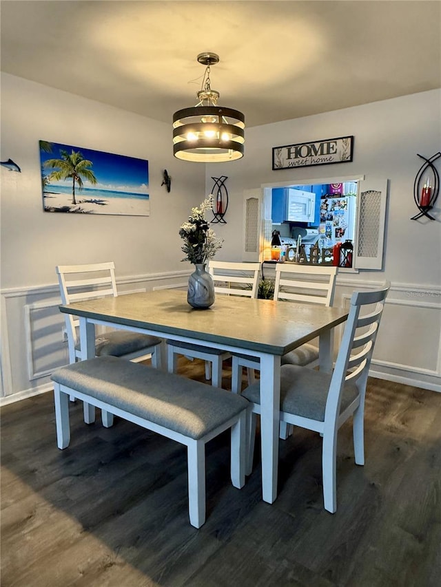 4264 Tamargo Dr Unit 3, New Port Richey, FL 34652 - dining area featuring wood finished floors