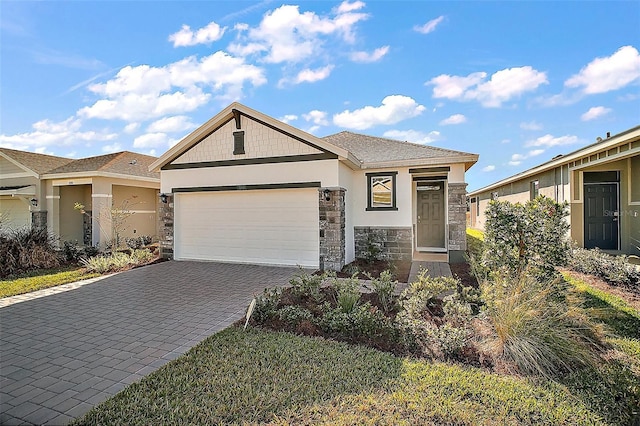4106 NW 44th Cir, Ocala, FL 34482 - single story home with an attached garage, stucco siding, decorative driveway, and stone siding