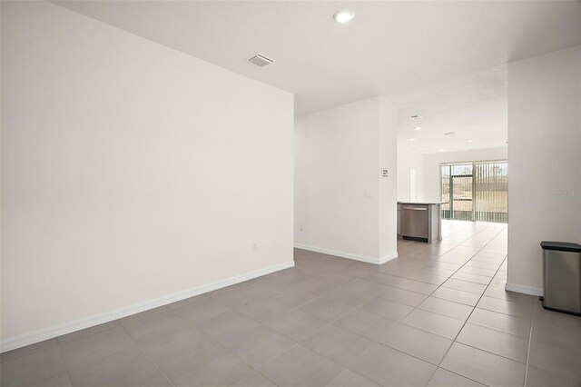 4106 NW 44th Cir, Ocala, FL 34482 - empty room featuring recessed lighting, baseboards, visible vents, and light tile patterned floors