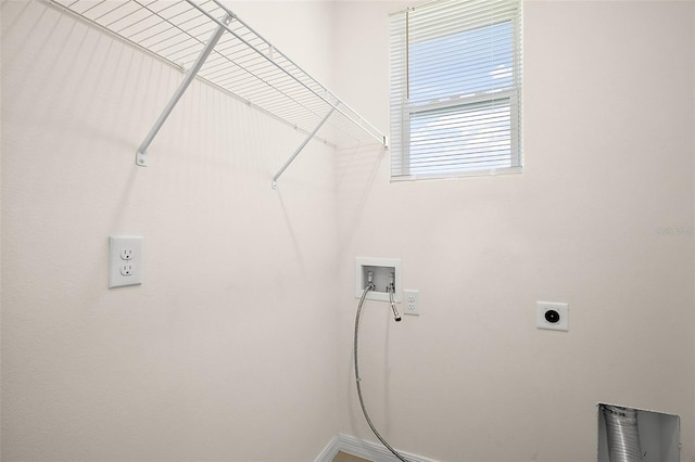 4106 NW 44th Cir, Ocala, FL 34482 - laundry area featuring laundry area, washer hookup, baseboards, and hookup for an electric dryer