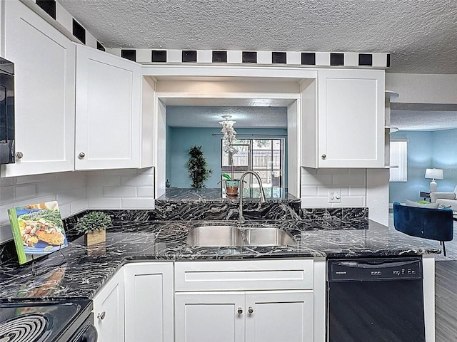 kitchen featuring black dishwasher, white cabinetry, a textured ceiling, and a sink