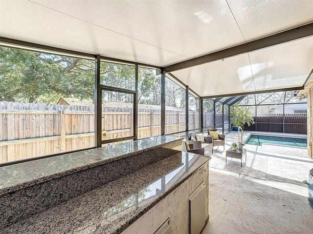 sunroom with outdoor lounge area