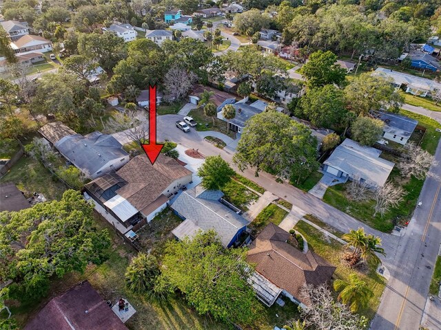 birds eye view of property with a residential view