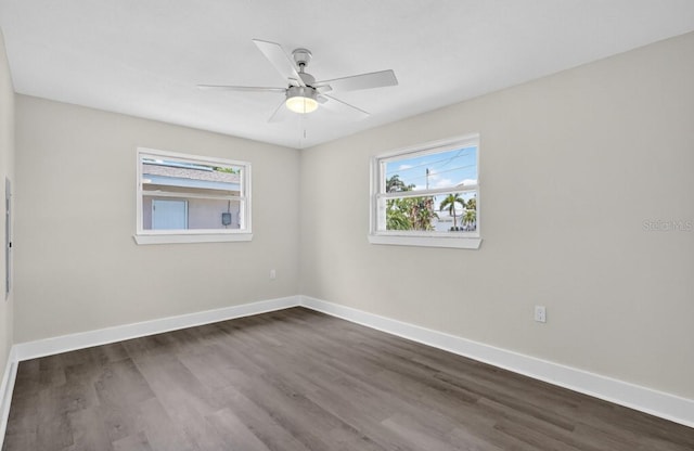 2175 Edythe Dr, Dunedin, FL 34698 - unfurnished room featuring dark wood-style floors and a ceiling fan