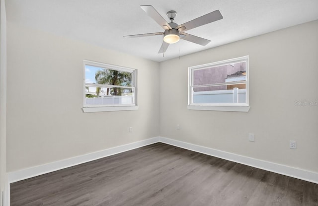 2175 Edythe Dr, Dunedin, FL 34698 - unfurnished room featuring dark wood-type flooring and ceiling fan