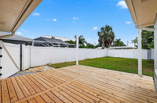 2175 Edythe Dr, Dunedin, FL 34698 - wooden terrace with a fenced backyard