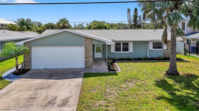 2175 Edythe Dr, Dunedin, FL 34698 - single story home with an attached garage, driveway, a shingled roof, and stone siding