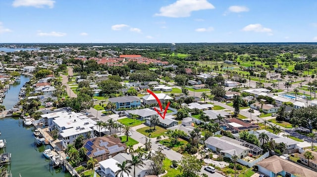 2175 Edythe Dr, Dunedin, FL 34698 - aerial perspective of suburban area featuring a large body of water
