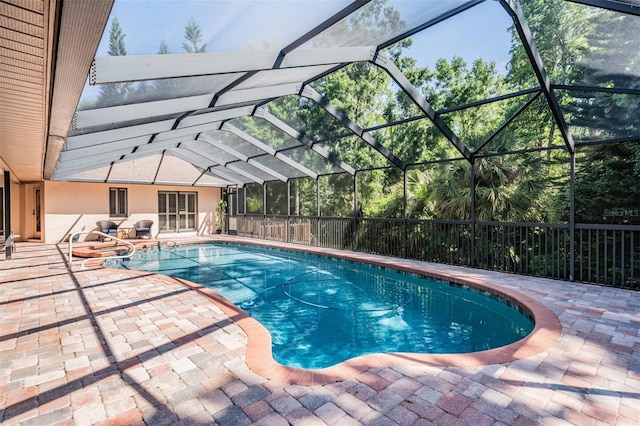 663 Turnberry Ct, Tarpon Springs, FL 34688 - view of pool featuring a fenced in pool, a lanai, and a patio area