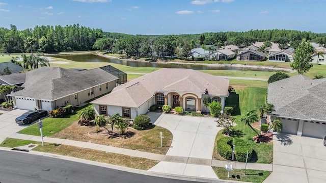 aerial view with a residential view and a water view