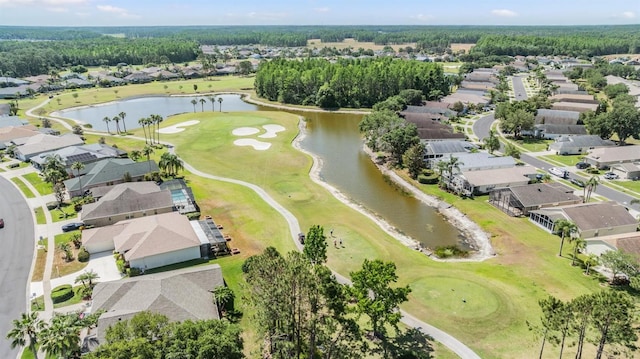 bird's eye view with a water view, a residential view, and golf course view