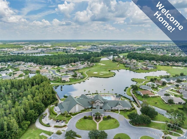 birds eye view of property with a residential view, a water view, and golf course view