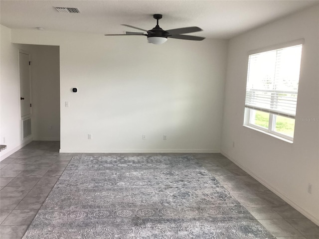 12630 Aston Dr, Hudson, FL 34669 - spare room featuring ceiling fan, visible vents, and baseboards