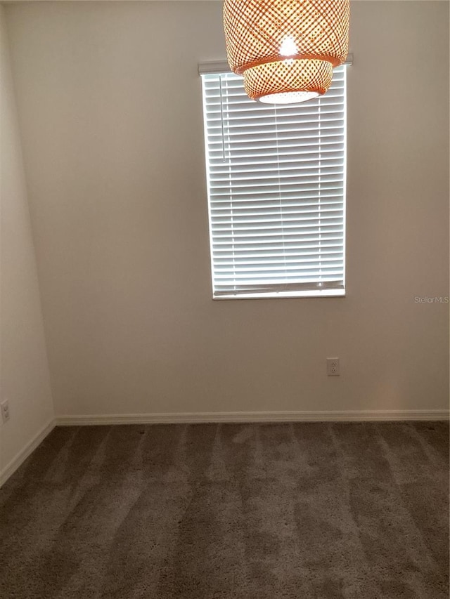 12630 Aston Dr, Hudson, FL 34669 - carpeted spare room with baseboards