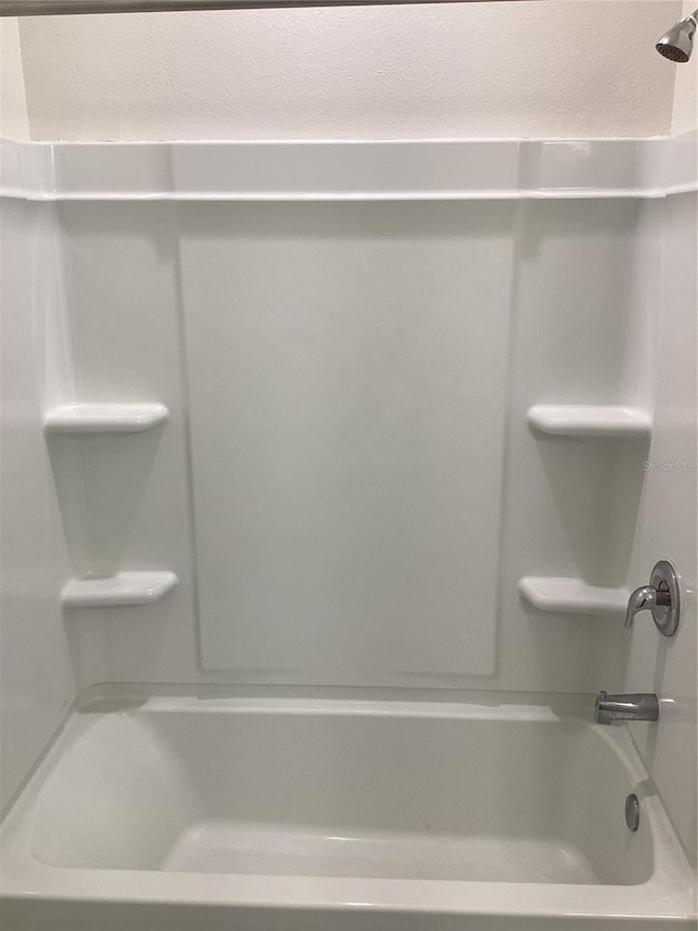 12630 Aston Dr, Hudson, FL 34669 - full bathroom featuring bathtub / shower combination