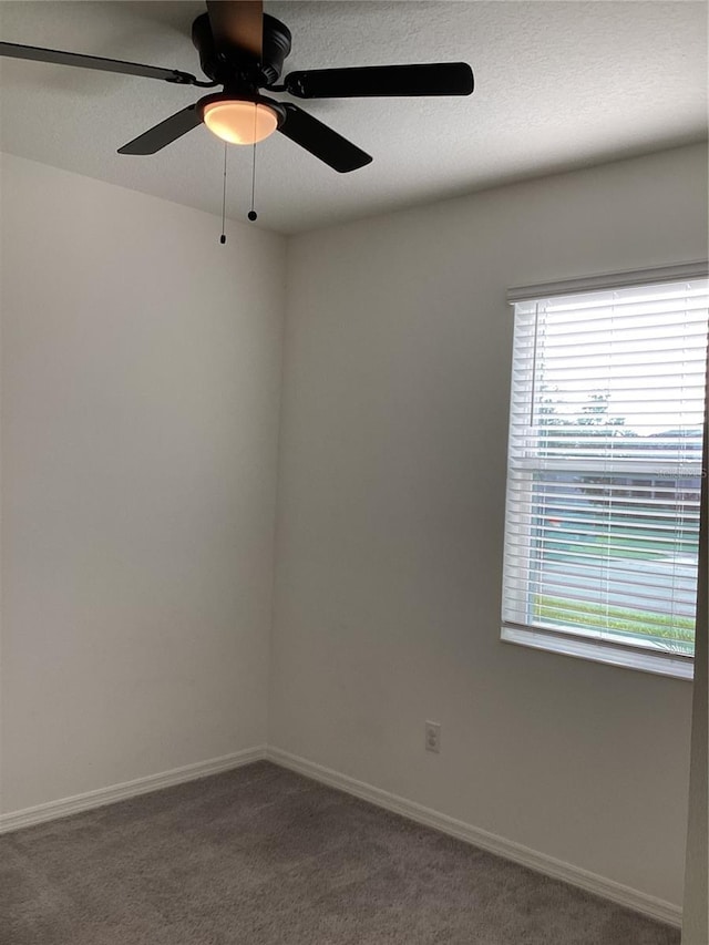 12630 Aston Dr, Hudson, FL 34669 - carpeted empty room with a ceiling fan and baseboards