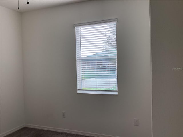 12630 Aston Dr, Hudson, FL 34669 - spare room with baseboards