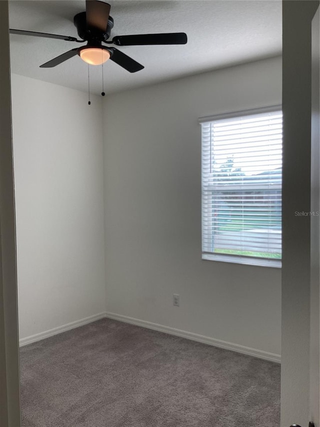 12630 Aston Dr, Hudson, FL 34669 - carpeted empty room featuring ceiling fan and baseboards