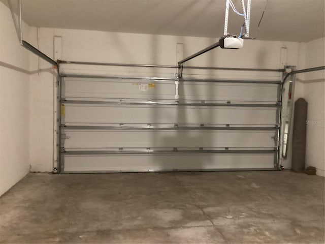 12630 Aston Dr, Hudson, FL 34669 - garage featuring a garage door opener