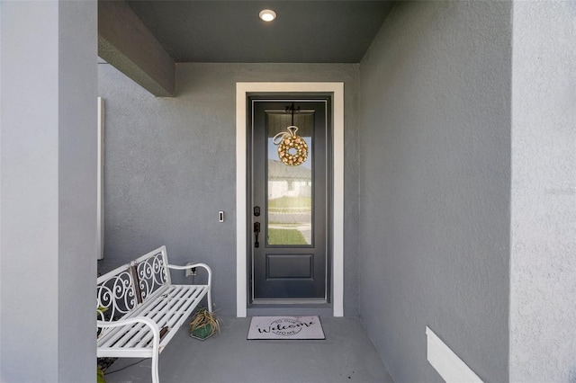 733 Old Windsor Way, Spring Hill, FL 34609 - entrance to property featuring stucco siding