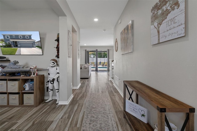 733 Old Windsor Way, Spring Hill, FL 34609 - hall featuring recessed lighting, baseboards, wood finished floors, and visible vents