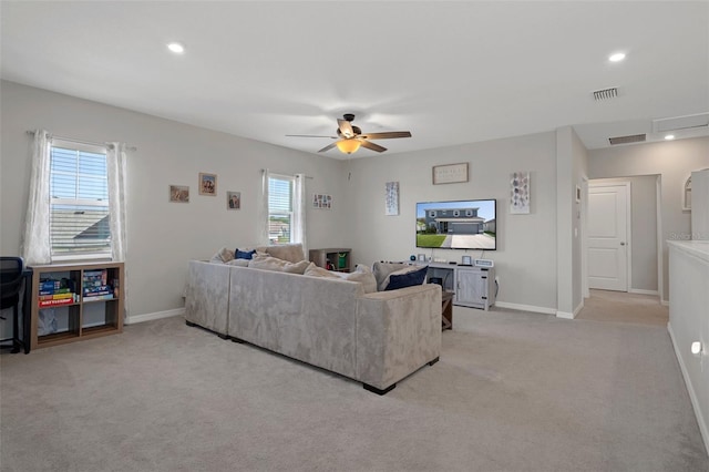 733 Old Windsor Way, Spring Hill, FL 34609 - living area featuring light colored carpet, ceiling fan, visible vents, and baseboards