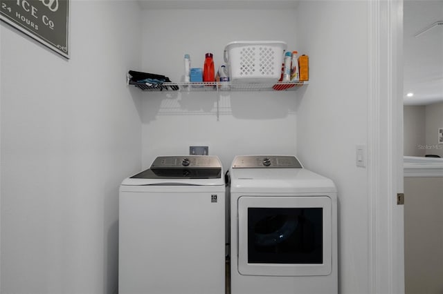 733 Old Windsor Way, Spring Hill, FL 34609 - clothes washing area featuring laundry area and washer and clothes dryer