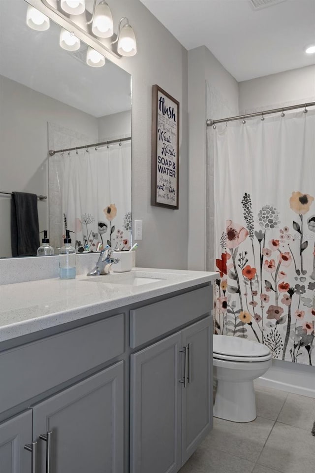 733 Old Windsor Way, Spring Hill, FL 34609 - bathroom with vanity, visible vents, toilet, tile patterned floors, and a shower with curtain