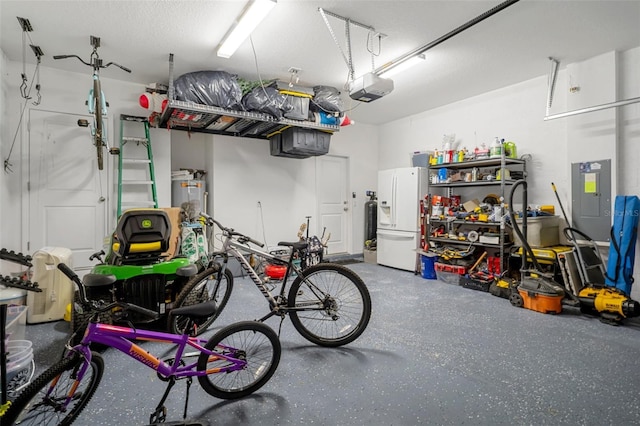 733 Old Windsor Way, Spring Hill, FL 34609 - garage featuring a garage door opener, water heater, electric panel, and white fridge with ice dispenser