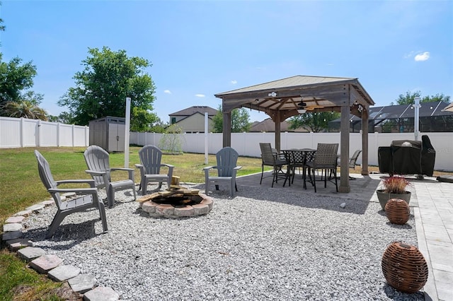 733 Old Windsor Way, Spring Hill, FL 34609 - view of patio / terrace featuring an outdoor structure, a gazebo, a fenced backyard, and a storage unit