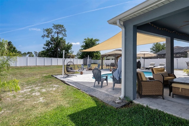 733 Old Windsor Way, Spring Hill, FL 34609 - view of yard featuring a fenced in pool, a fenced backyard, ceiling fan, and a patio area