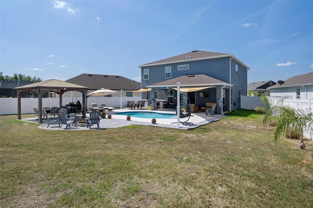 733 Old Windsor Way, Spring Hill, FL 34609 - rear view of property featuring a gazebo, a fenced backyard, and a patio area