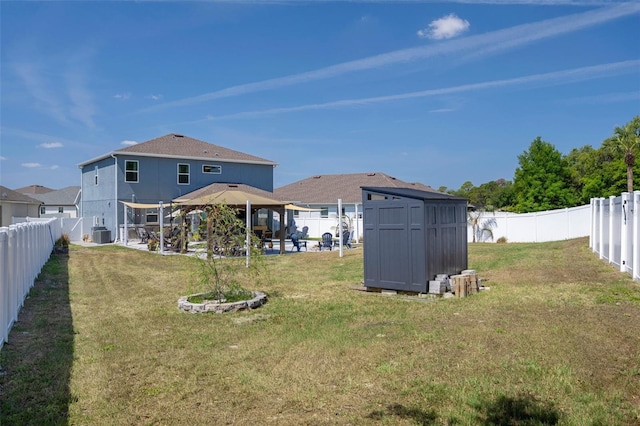 733 Old Windsor Way, Spring Hill, FL 34609 - view of yard with a storage shed, an outbuilding, a gazebo, and a fenced backyard
