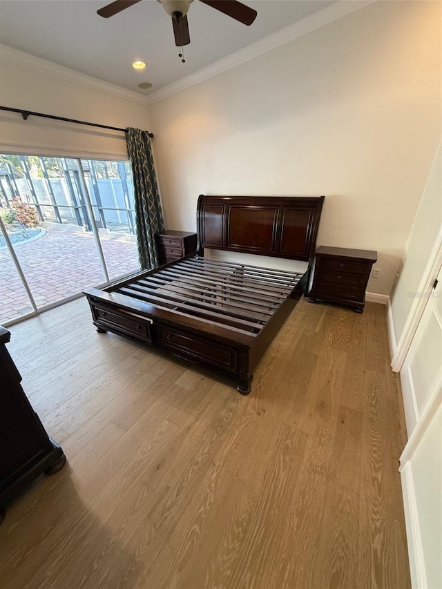 210 S Hale Ave, Tampa, FL 33609 - bedroom with access to outside, light wood-style floors, ornamental molding, ceiling fan, and recessed lighting