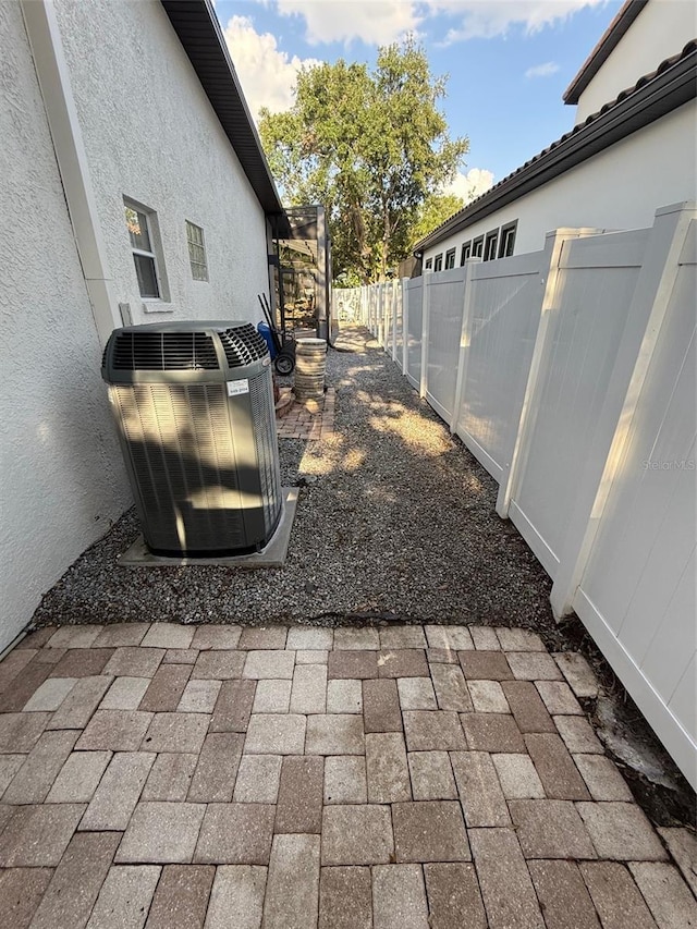 210 S Hale Ave, Tampa, FL 33609 - view of yard featuring central AC unit