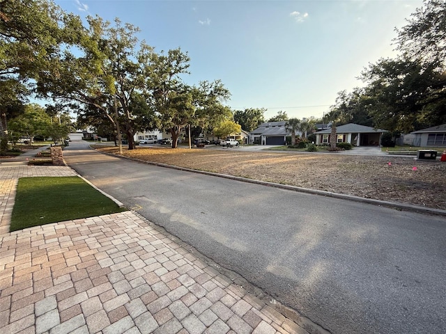 210 S Hale Ave, Tampa, FL 33609 - view of asphalt road with a residential view and curbs