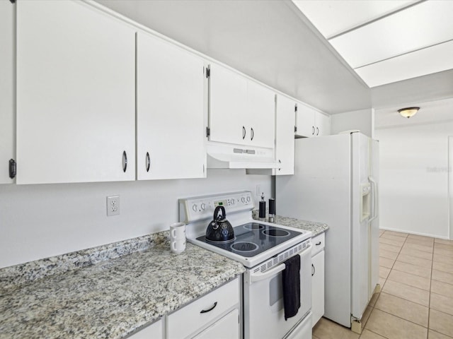 kitchen featuring light tile patterned floors, light stone counters, under cabinet range hood, white appliances, and white cabinetry