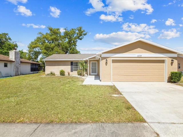 ranch-style home featuring an attached garage, a front lawn, stucco siding, and concrete driveway