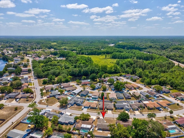 bird's eye view with a residential view and a view of trees