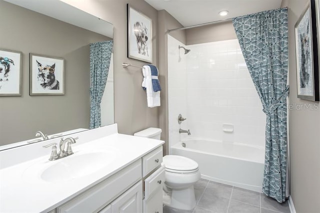 full bathroom with vanity, shower / tub combo with curtain, tile patterned floors, and toilet