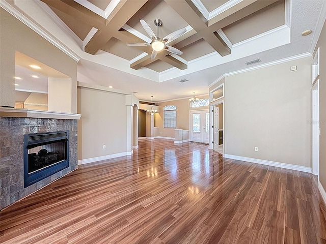 3464 Misty View Dr, Spring Hill, FL 34609 - unfurnished living room with a chandelier, a multi sided fireplace, ornamental molding, ceiling fan, and coffered ceiling
