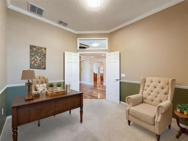 3464 Misty View Dr, Spring Hill, FL 34609 - carpeted office featuring arched walkways, a textured ceiling, crown molding, and baseboards