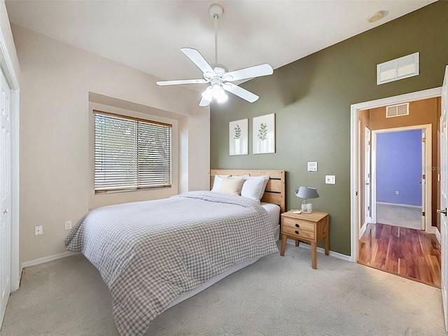 3464 Misty View Dr, Spring Hill, FL 34609 - carpeted bedroom with baseboards and a ceiling fan