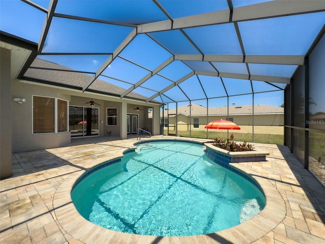 3464 Misty View Dr, Spring Hill, FL 34609 - swimming pool with a ceiling fan, a patio, and glass enclosure