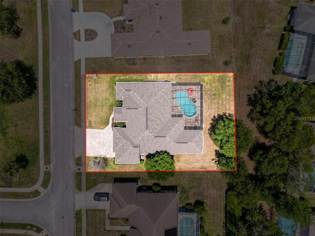 3464 Misty View Dr, Spring Hill, FL 34609 - aerial view of property and surrounding area with property boundaries highlighted and a pool